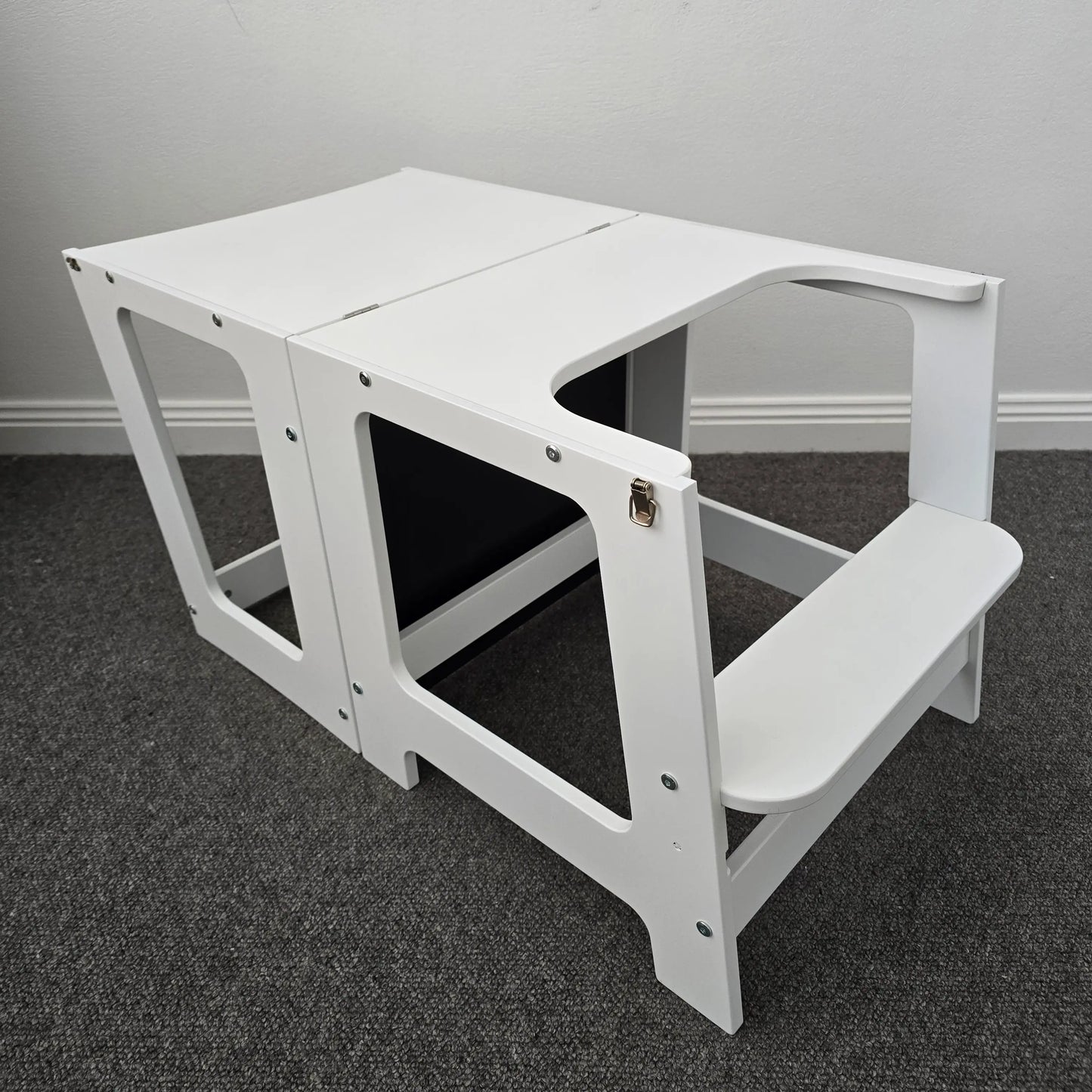 Main image of the Four Little Monkeys Convertible Learning Tower, shown in its table configuration with multipurpose blackboard in white colour.