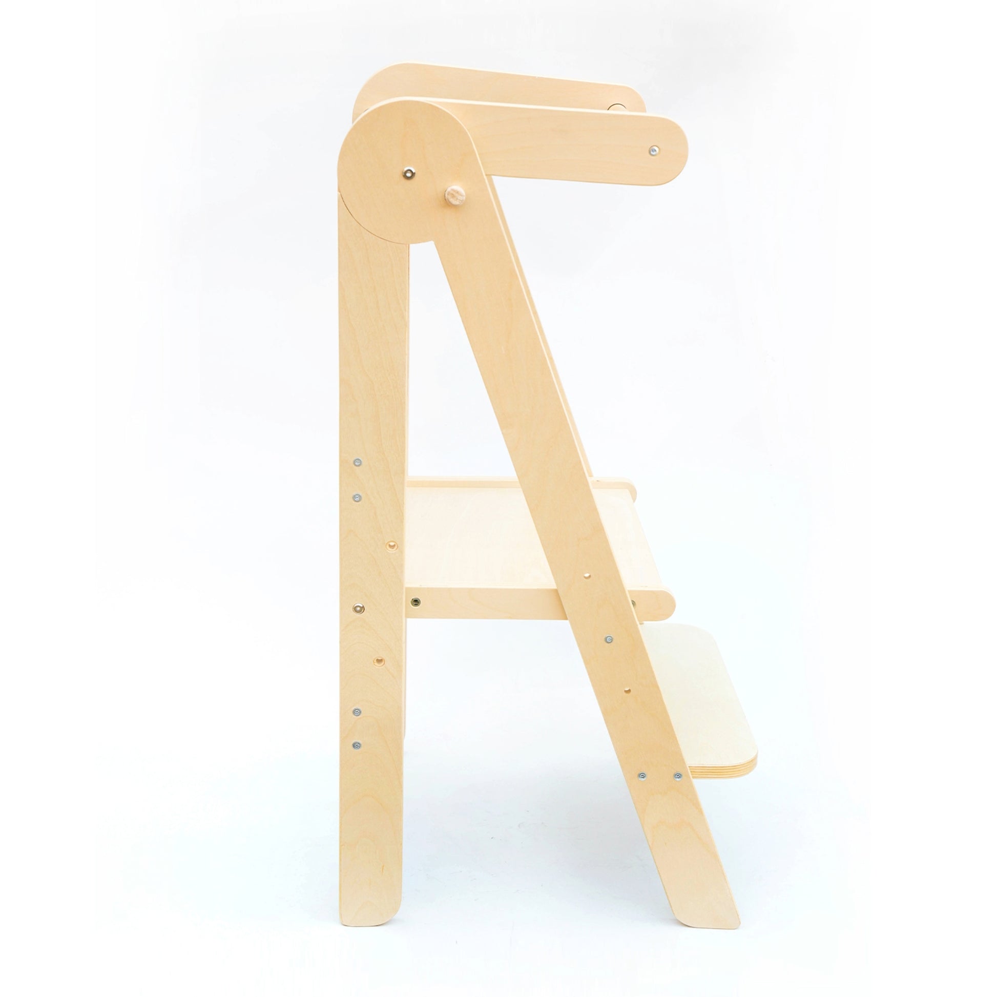 Side view of the Natural Adjustable Foldable Learning Tower illustrating the sleek design and stability on a white background.