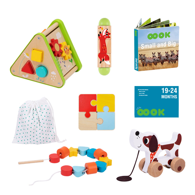 Contents of the Monkey Play and Learn Kit for toddlers aged 19 to 24 months, featuring a range of engaging, Montessori-inspired toys like a puzzle, pull-along dog, lacing beads, shape sorter, twizzling blocks, picture book and a parent guide.