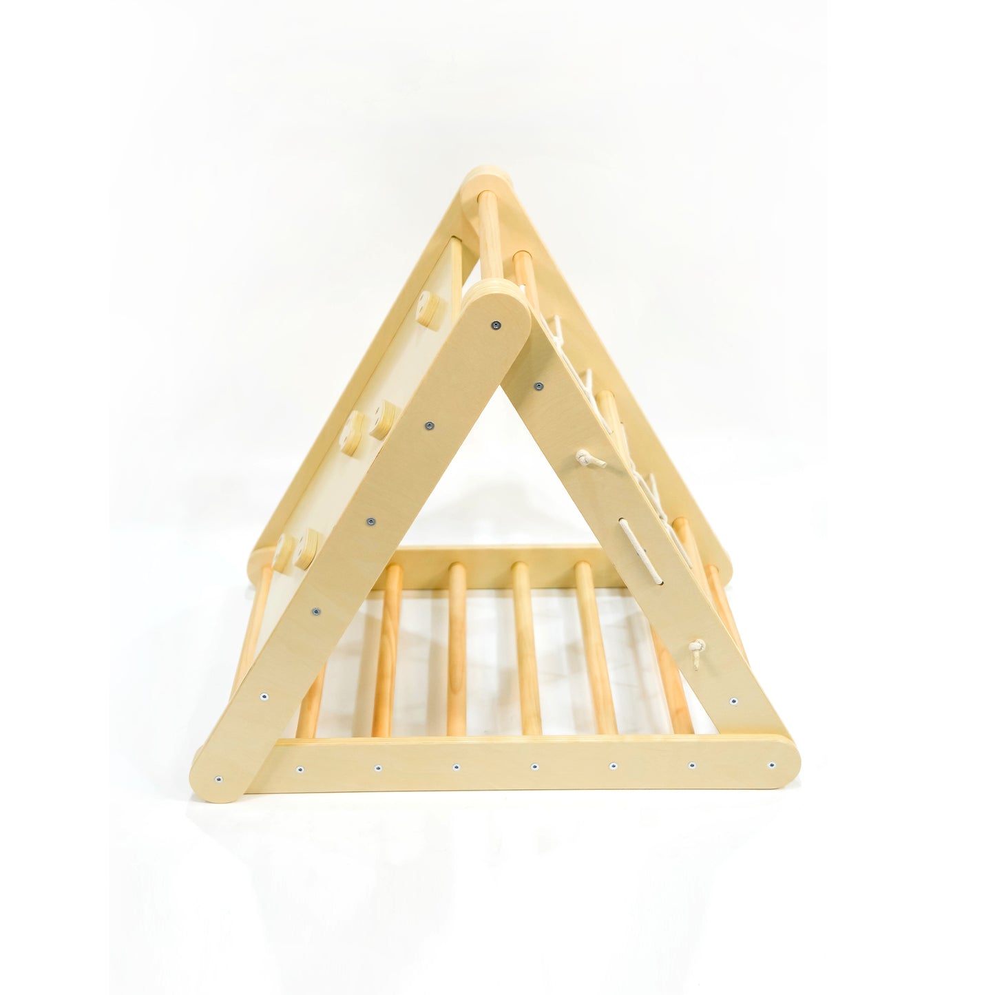 Side profile shot of the Pikler Climbing Triangle, displaying its sturdy wooden frame and side climbing features against a seamless white background.