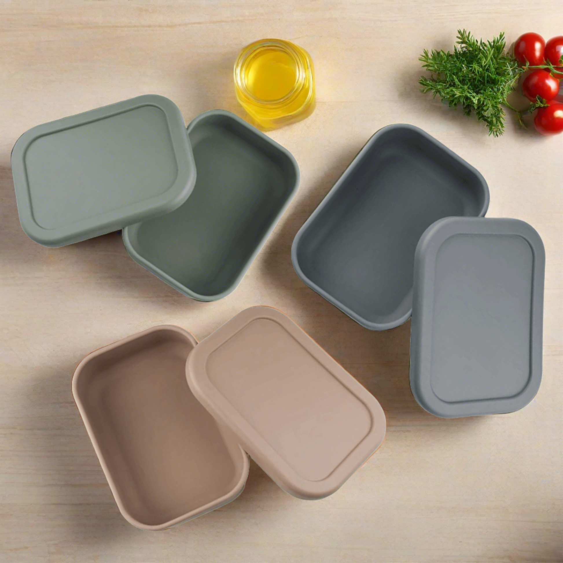 A full collection of Silicone Bento Lunch Boxes displayed in stylish sage green, modern grey, and cozy warm taupe colors, showcasing their unbreakable design, single compartment, and leak-proof lids perfect for kids' mealtime.